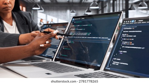 Software Engineer And Programmer Collaborate On Coding Project At Desk.