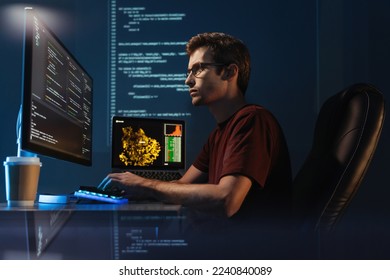 Software engineer working on new app, checking coding in bugging system, sitting in comfortable chair, typing in front of pc, on digital wall with code background
