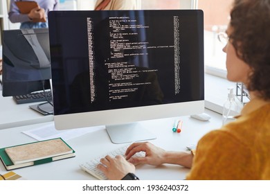 Software Engineer Writing Code at Computer