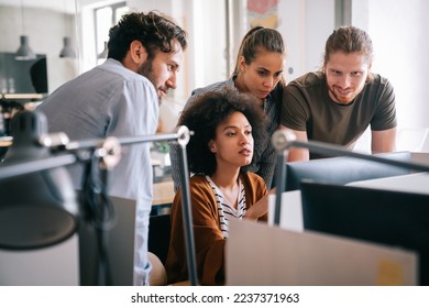 Software engineers working on project and programming in company