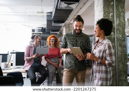 Software engineers working on project and programming in company