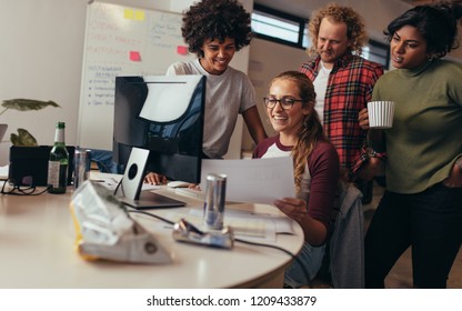 Software Engineers Working Together On Project At Tech Startup. Group Of Programmers Working Together On Developing New Codes For A Software.