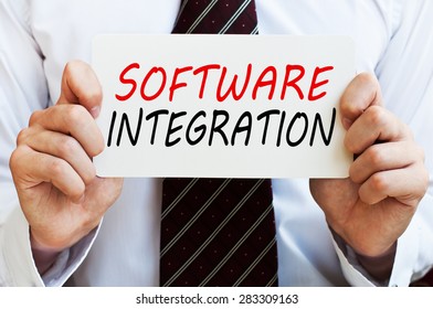 Software Integration Written On Card In Male Hands