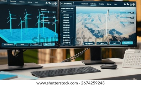 Software interface on PC used for planning wind farm layouts, determining optimal turbine placements. CAD program on computer in engineering office used to design windmills farm configurations