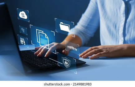  Software online documentation database and digital file storage system and file access concept.Enterprise resource planning. Business person using a laptop with digital graph to document management. - Shutterstock ID 2149881983