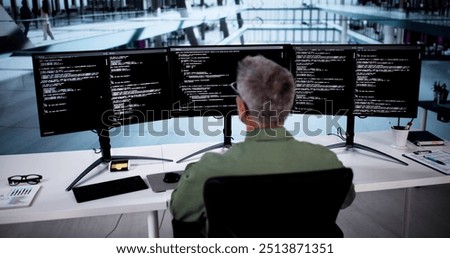 Software Programmer Or Coder Man Using Office Computer