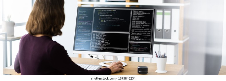 Software Programmer Or Coder Woman Using Office Computer