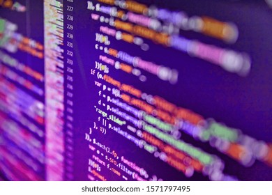 Software technology background showing programming source code on computer screen.