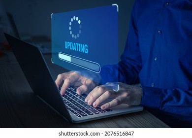 Software update or operating system upgrade to keep the device up to date with added functionality in new version and improve security. Updating progress bar on computer screen. Installing app patch. - Shutterstock ID 2076516847