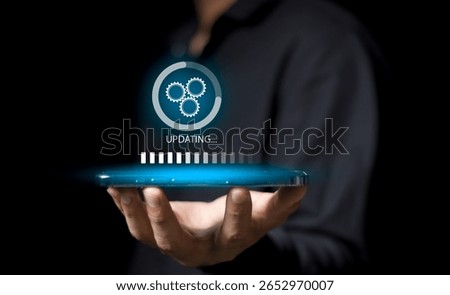 Software update or operating system upgrade concept. Man working and installing update process. Installing update process, Improved functionality in the new version and improved security.