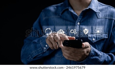 Software update or operating system upgrades to keep your device up to date with enhanced functionality in new versions and improved security. Man using smartphone to install software update. 