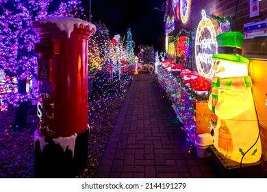 SOHAM, CAMBRIDGESHIRE UK - DECEMBER 28, 2021: A Soham Couple Turn Their House Into An Incredible Christmas Light Display, Raising Thousands Of Pounds, This Year For East Anglia's Children's Hospice.