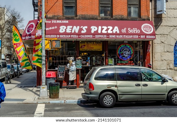 SoHo,\
New York City, United States 27 Mar 2013: Ben\'s Pizza of SoHo\
Restaurant with Car parked in front, New York\
City