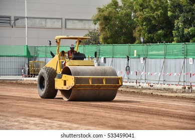 soil compaction machine compacting soil under the construction in the factory - Powered by Shutterstock