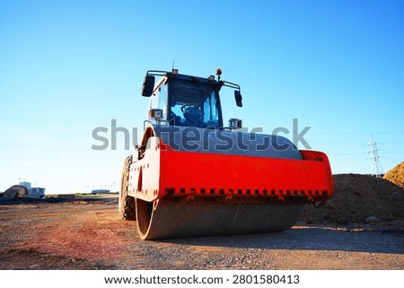 Soil Compactor on compact the road surface during road construction. Road compaction equipment at construction site. Vibration single-cylinder road roller, Vibratory Soil Compactor. Single Drum Roller on highway construction.