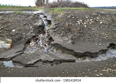 Soil erosion by water lofting earth away