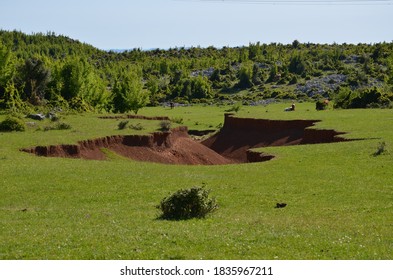 Soil Erosion In A Green Lawn.