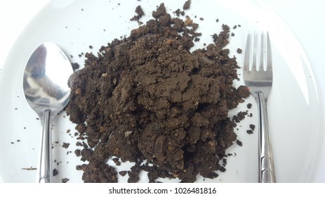 soil-on-plate-concept-that-260nw-1026481816.jpg