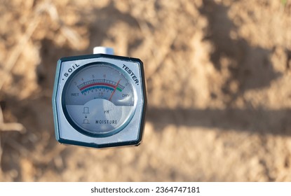 Soil pH meter and soil fertility meter for cultivation.p value It is an indicator of plant nutrient absorption. Different plants require different pH values. - Shutterstock ID 2364747181