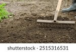 soil preparation farming, garden rake tilling, soil quality improvement, farmland soil care, agricultural maintenance, organic farming practices, sustainable soil management, fertile land cultivation