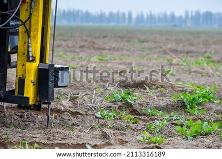 Soil Sampling - automated probe for soil samples taking sample with soil probe sampler. Precision agricultural technology advancing fast, detailed field information. Certification and Protection soil.