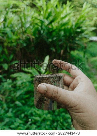 Soil sampling with ring sampler for bulk density measurement in agricultural research