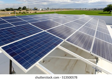 The Solar Array On The Roof Of A Commercial Business, To Offset Energy Costs.