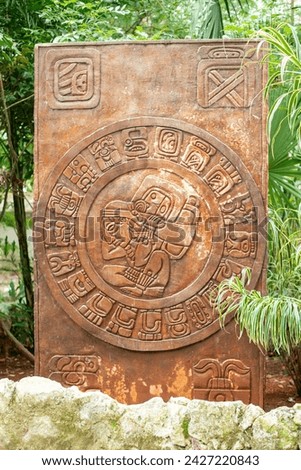 solar calendar of the Maya formed by circle of 19 months glyphs forms of the haab and a  time-bearing god