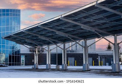 A solar carport for producing renewable energy and electric vehicle charging is a green alternative in Airdrie Alberta Canada.