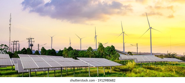 Solar cell panels and wind turbines in sunset sky for alternatively power generator source, renewable energy for future power supply and eco-friendly with environment