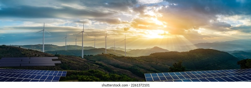 solar cell plant and wind generators under blue sky on sunset.Powerplant with photovoltaic panels and eolic turbine.
clean energy, sustainable, Eco,earth day,green energy,love nature,eco energy concept. - Shutterstock ID 2261372101