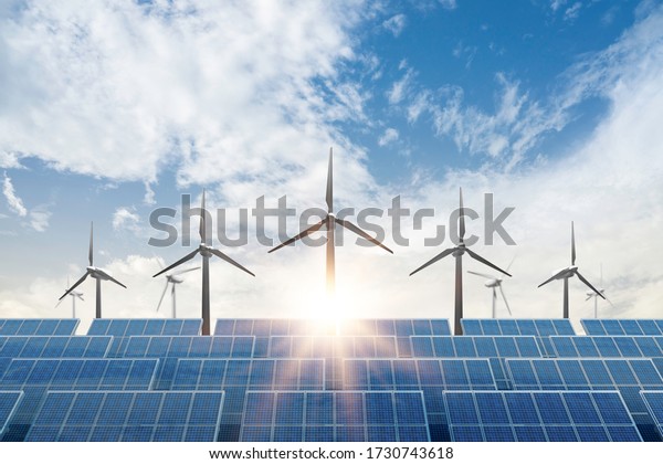 solar cell plant and wind generators\
under blue sky on sunset.Powerplant with photovoltaic panels and\
eolic turbine.clean energy and eco energy\
concept.