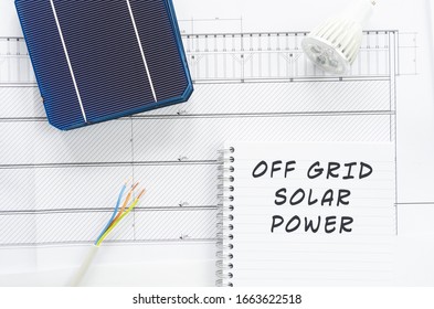 Solar Cells, Wires And Led Bulb In Conceptual Image Of Building Off Grid Solar Power Plant.