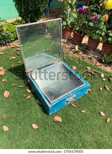 Solar cooker cooks food in a\
natural setting under sun without usage of gas and water. Put raw\
vegetables in black coloured containers placed inside the\
mirror.