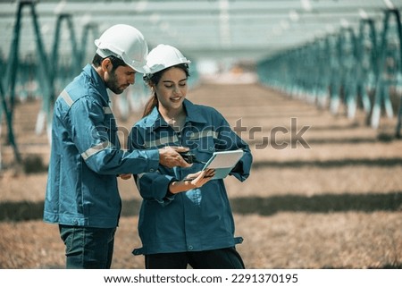 Solar design engineers visually inspect photovoltaic array installation sites for suitable alignment, surface, sunlight access, and structural stability. System maintenance and operation records.
