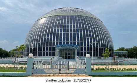 Solar Dome Planetarium And Auditorium With Full Of Solar Panel On Outside Wall, Go Green Technology, Solar Cell Energy Conceptual Background