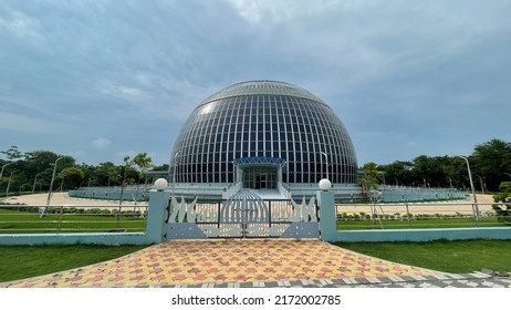 Solar Dome Planetarium And Auditorium With Full Of Solar Panel On Outside Wall, Go Green Technology, Solar Cell Energy Conceptual Background