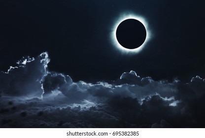 Solar eclipse. Deep space image, science fiction fantasy in high resolution ideal for wallpaper and print. Elements of this image furnished by NASA