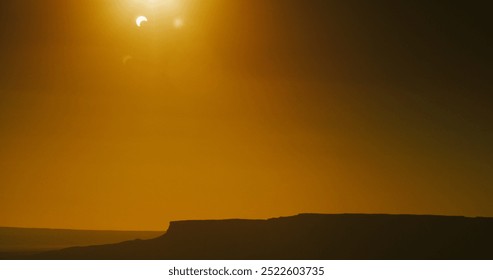 Solar eclipse, “Ring of Fire” event of 2017, over classic desert mesa features on the Navajo Nation in Arizona.