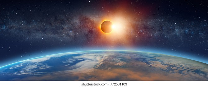 Solar Eclipse  in front of the Milky Way galaxy "Elements of this image furnished by NASA " - Powered by Shutterstock