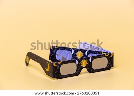 Solar eclipse glasses providing protection for viewing a celestial event