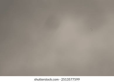 Solar eclipse image with cloudy sky