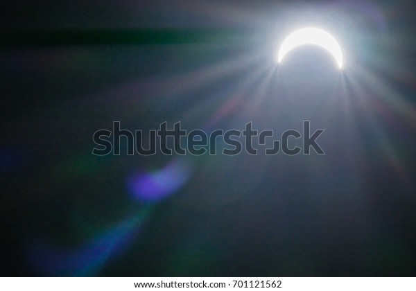 solar eclipse\
with lights effects\
backgrounds
