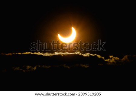 Solar Eclipse Marvel: Capturing the Astounding Phenomenon, Sun Fading Against a Dark Canvas