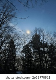 A solar eclipse in Tupper Lake, NY, capturing the celestial event in the sky.