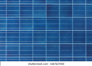 Solar Energy Solar Cell Connections, Silicon And Encapsulant A Nice Technology Blue Pattern. Perspective View Of The Poly Crystalline Silicon Solar Cells Around The Solar Panel. Nice Textured Pattern