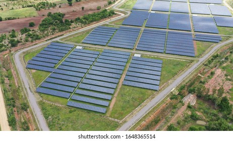 Solar energy farm. Aerial view of a solar farm in Asia. - Shutterstock ID 1648365514