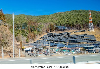 The Solar Energy Farm At The Kawaguchiko City Village From Inside The Bus Windshield. Kawaguchiko, Japan February 9, 2020