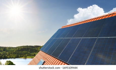 Solar energy panels at the rooftop on a sunny day with copy space