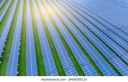 Solar farm and sun light. Solar power for green energy. Sustainable renewable energy. Photovoltaic power station or solar park. Solar panel installation and maintenance concept. Energy sustainability.